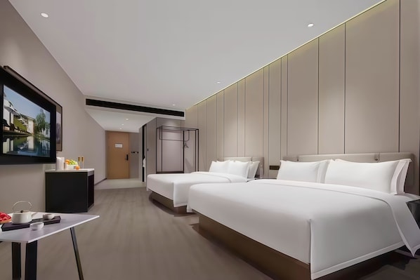 Family Quadruple Room, City View | Premium bedding, down comforters, memory foam beds, desk