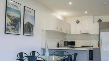 Coffee/tea maker, fridge, microwave, oven