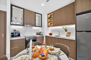 Appartement Premium, 1 très grand lit et 1 canapé-lit, vue ville | Cuisine privée | Cafetière/bouilloire