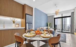 Premium Apartment, 1 King Bed with Sofa bed, City View | Dining room - Feather & Stone 1BR - City Skyline (Dubai)