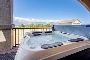 A hot tub on a balcony with a mountain view. - Mtn Getaway Near Air Force Academy w/ Hot Tub (Colorado Springs)