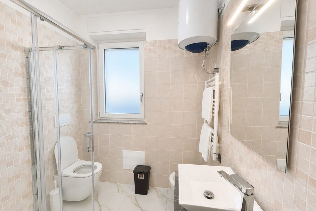 Doccia, bidet, asciugamani