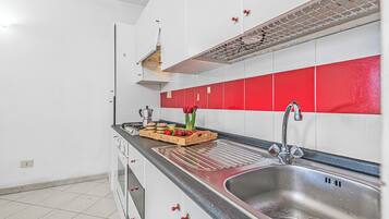 Apartamento família, 1 quarto, micro-ondas (Il Faro di Capo Ceraso) | Cozinha privada