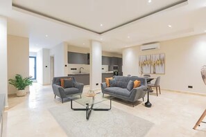 Apartament Deluxe, vistes a la ciutat | Sala d'estar