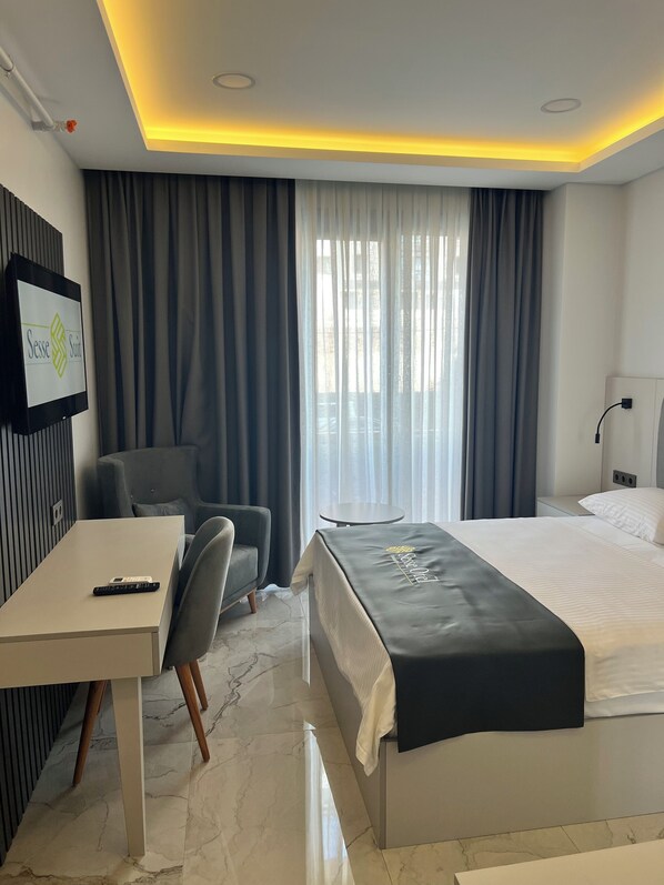 Deluxe Double Room, City View | In-room safe, desk, soundproofing, iron/ironing board (on request)