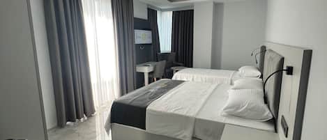 Twin Room, City View | In-room safe, desk, soundproofing, iron/ironing board (on request)