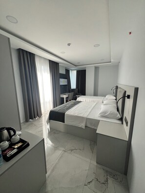 Twin Room, City View | In-room safe, desk, soundproofing, iron/ironing board (on request)