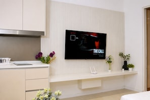 Suite estudio familiar, balcón, vistas a la ciudad | Wifi gratis y ropa de cama