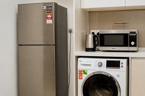 Suite estudio familiar, balcón, vistas a la ciudad | Wifi gratis y ropa de cama