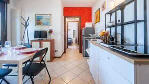 Private kitchen - A cozy and comfortable 47 sqm apartment, perfect for four people, located on the first floor of a building with an elevator.The property is situated in a quiet yet strategic area near Parma's city center; the train station, airport, and highway entrance  (Parma)
