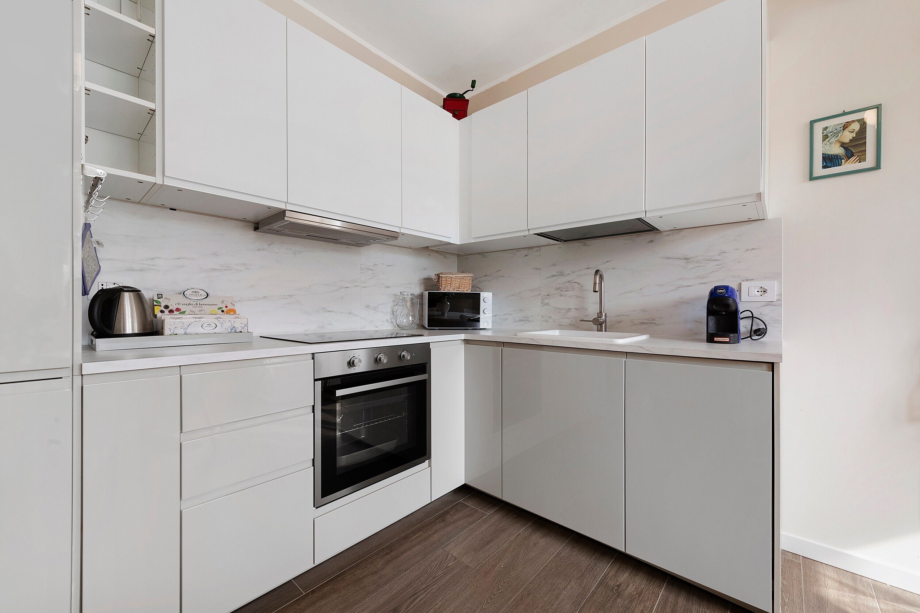 Coffee/tea maker, fridge, microwave, oven