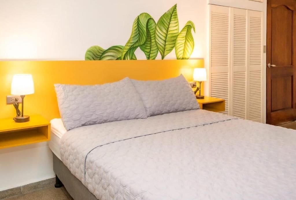 Double Room, Private Bathroom | Desk, blackout drapes, iron/ironing board (on request), WiFi (free)