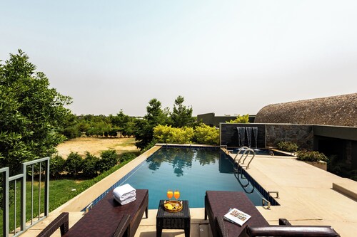 ELIVAAS Stone Age 4BHK Villa with Pool 