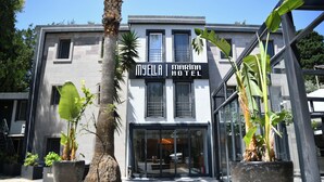 A modern hotel building with a sign reading 'MYELLA MARINA HOTEL'. - MyElla Marina Hotel (Bodrum)