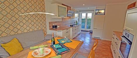 Coffee/tea maker, fridge, microwave, oven