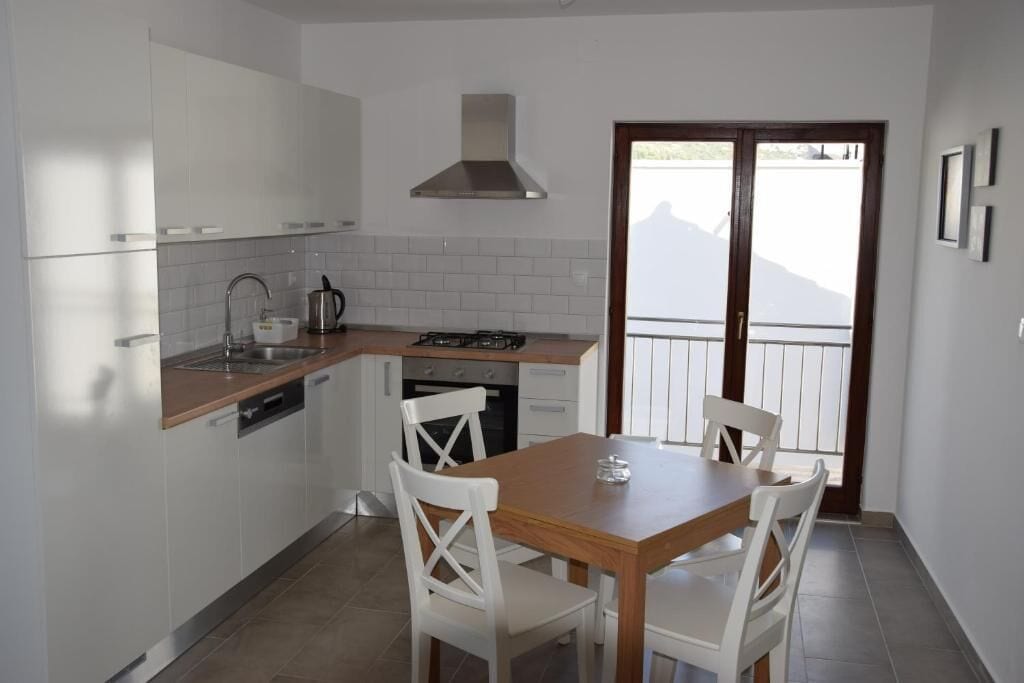Departamento Confort, vista al mar | Cocina privada