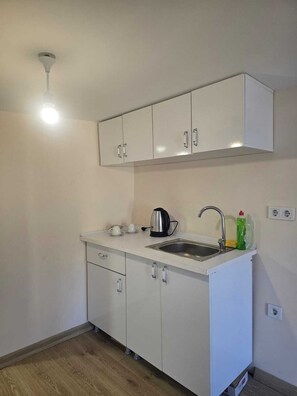 Habitación Confort | Cocina privada