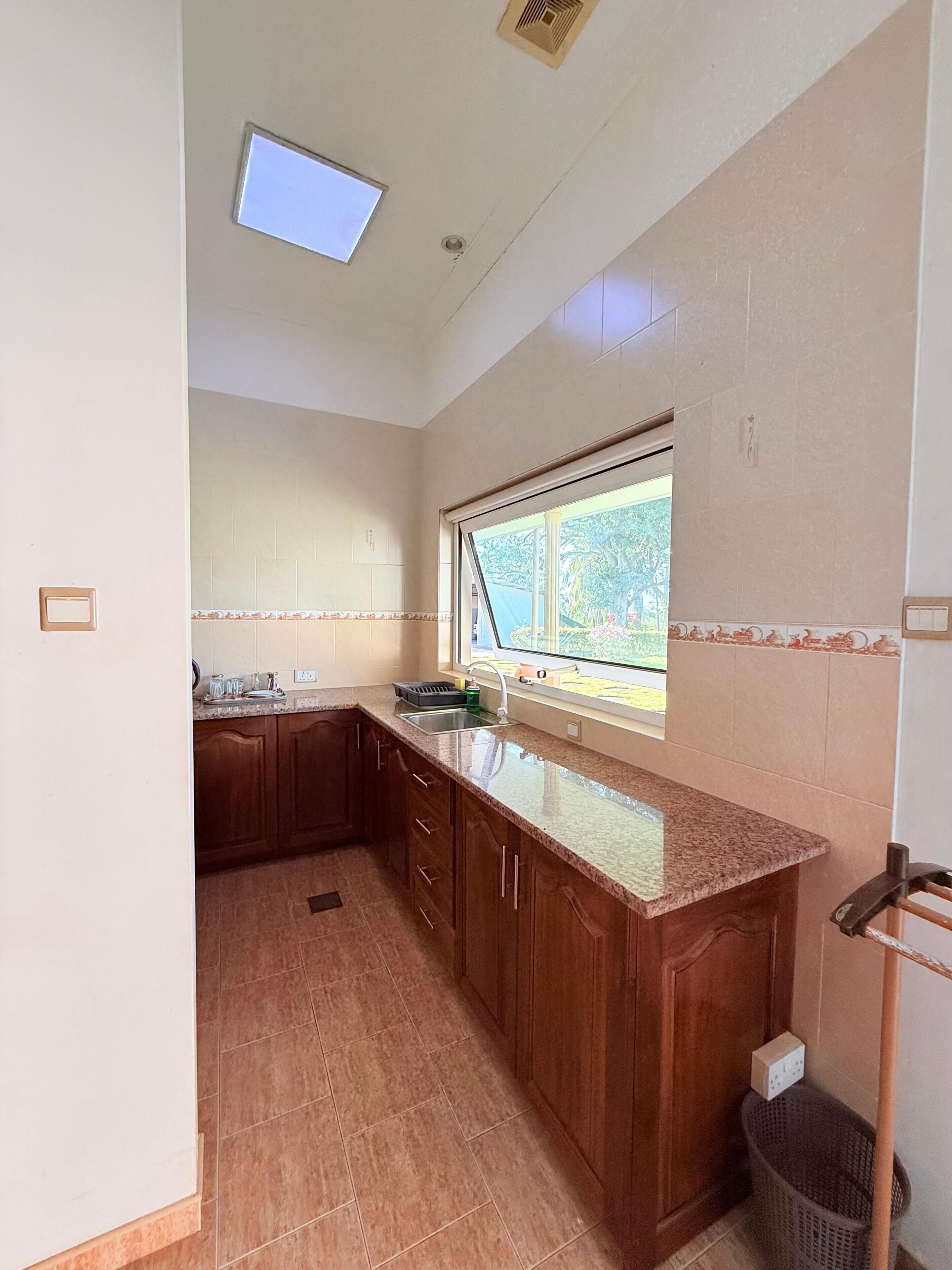 Standard Triple Room, Garden View | Private kitchen | Fridge, microwave, electric kettle
