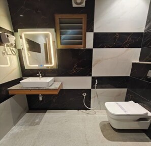Premium Room | Bathroom | Shower, towels, soap, shampoo - Hotel Orange Orchid (Tirunelveli)