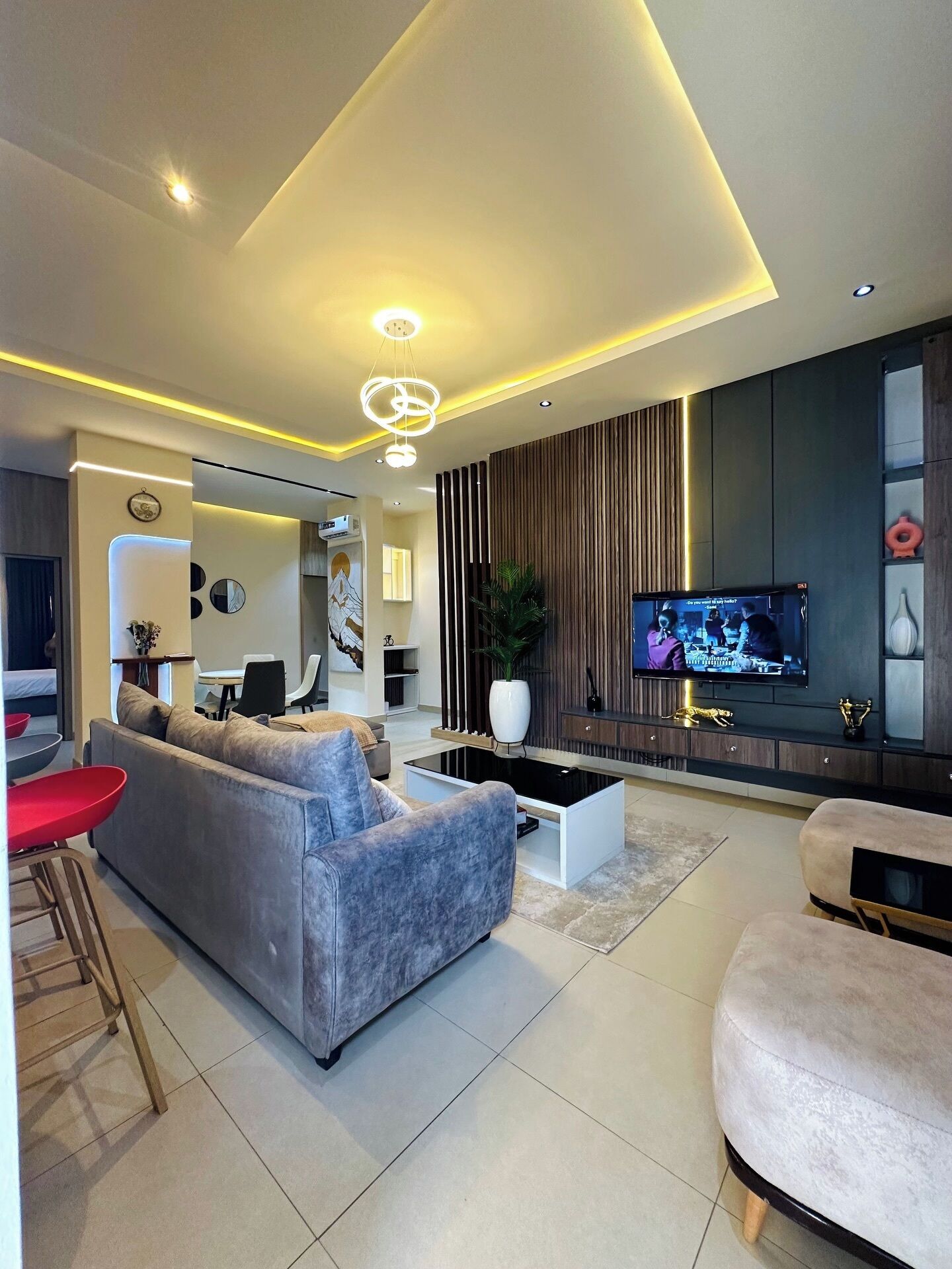 Departamento Deluxe, balcón, vista a la ciudad | Área de sala de estar