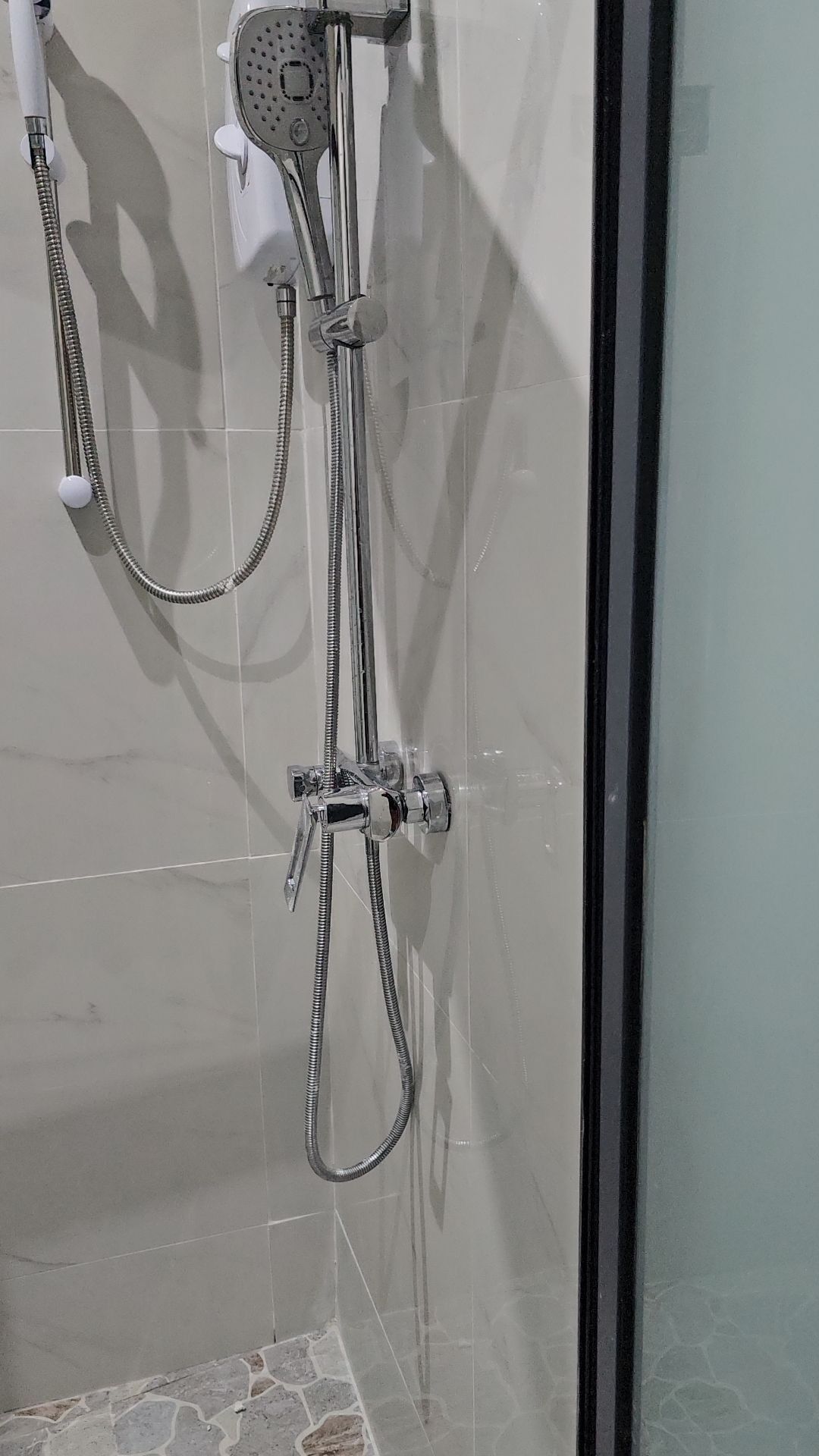 Shower, towels, toilet paper