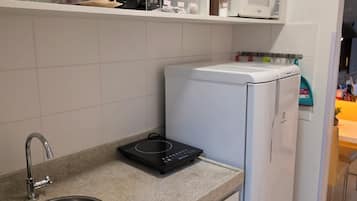 Premium Loft, City View | Private kitchen | Full-size fridge, microwave, stovetop, cookware/dishes/utensils