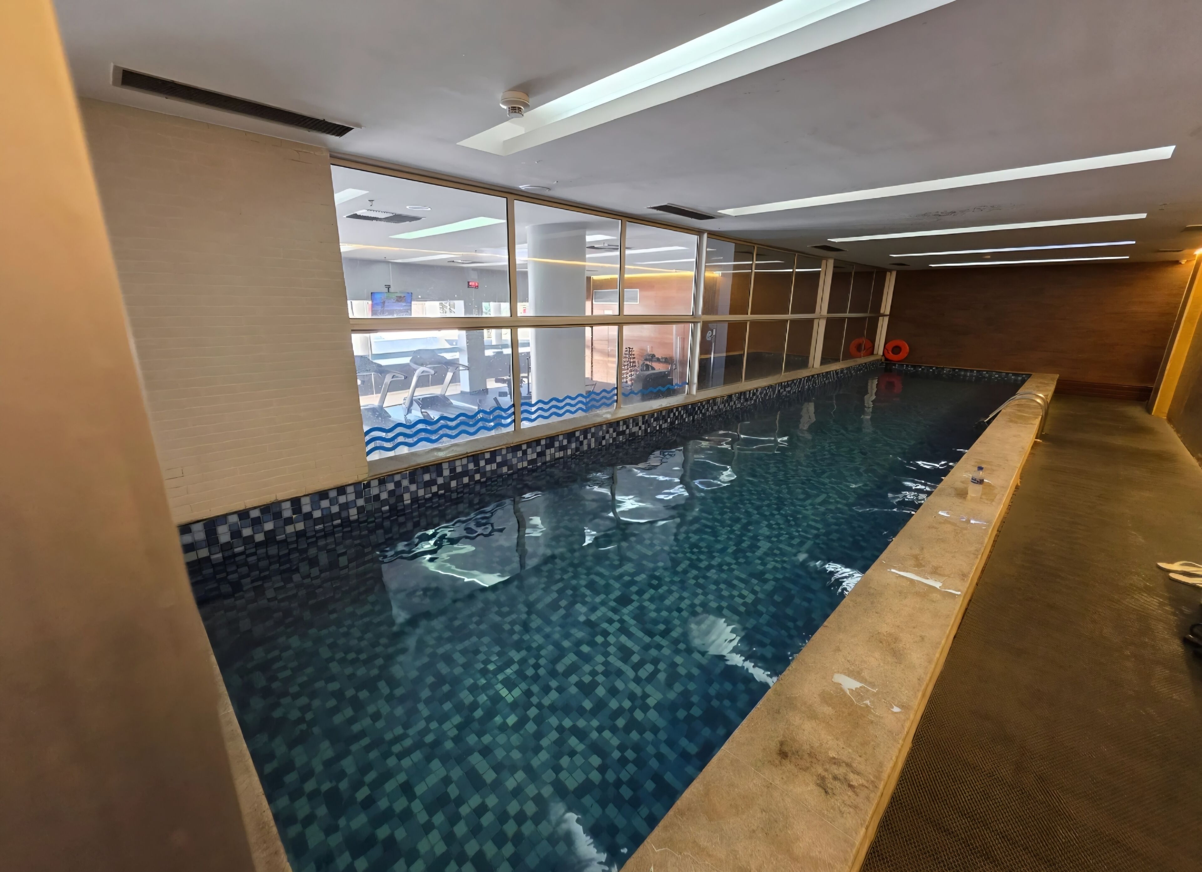 Indoor pool, outdoor pool, open 6:00 AM to 10:00 PM, pool umbrellas