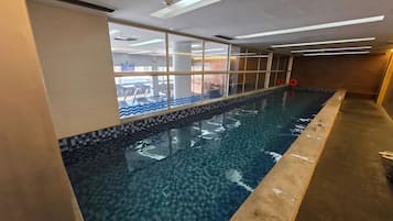Indoor pool, outdoor pool, open 6:00 AM to 10:00 PM, pool umbrellas