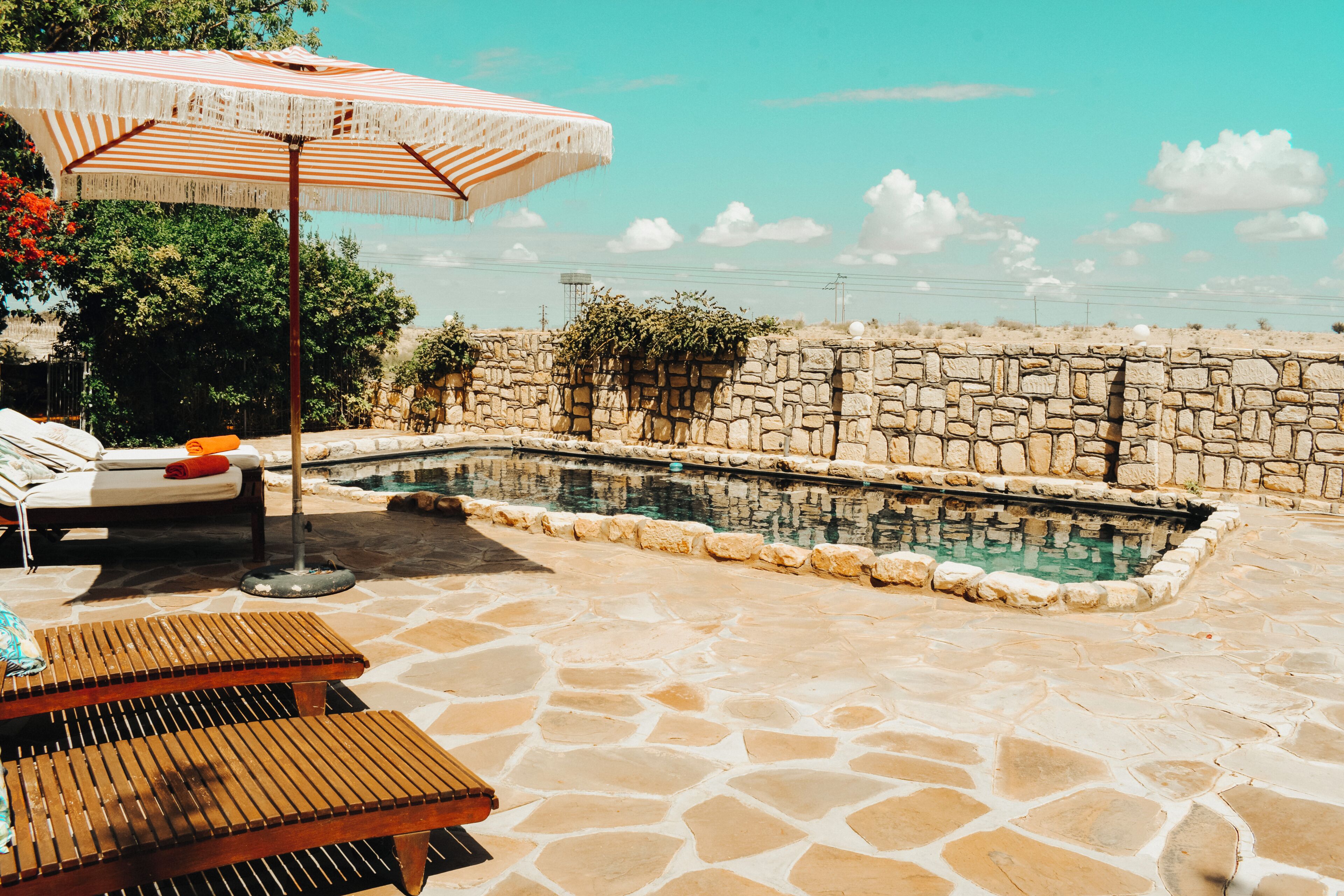 Outdoor pool, pool umbrellas, pool loungers
