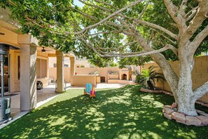 A courtyard with a tree, a barbecue area, and a small pool. - Outdoor Oasis w/ Pool! Glendale Group Escape (Glendale)
