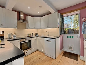 House | Private kitchen | Stovetop, high chair - Historic Wiltshire Garden Cottage (Trowbridge)