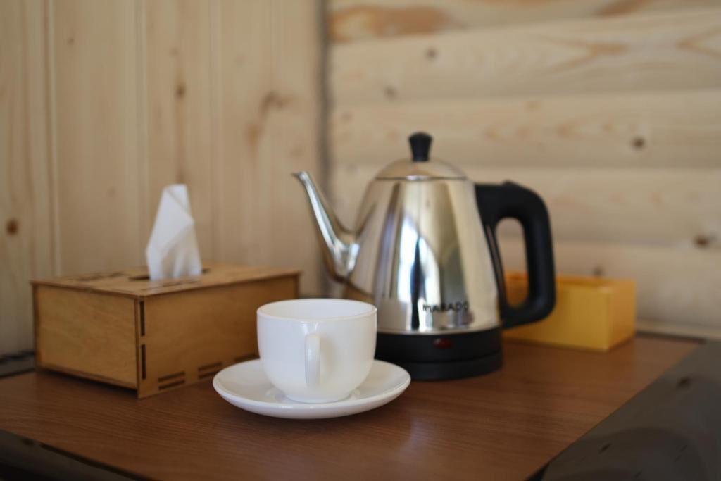 Triple Room, Balcony, City View | Coffee and/or coffee maker