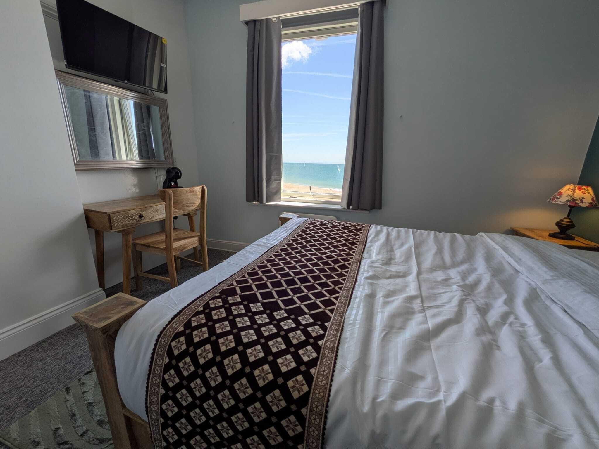 Habitació doble Deluxe, vistes al mar | Escriptori, espai de treball apte per a portàtils i wifi gratuïta 