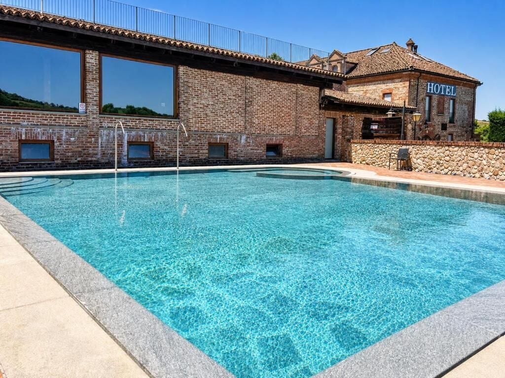 Seasonal outdoor pool, open 10:00 AM to 7:00 PM, sun loungers