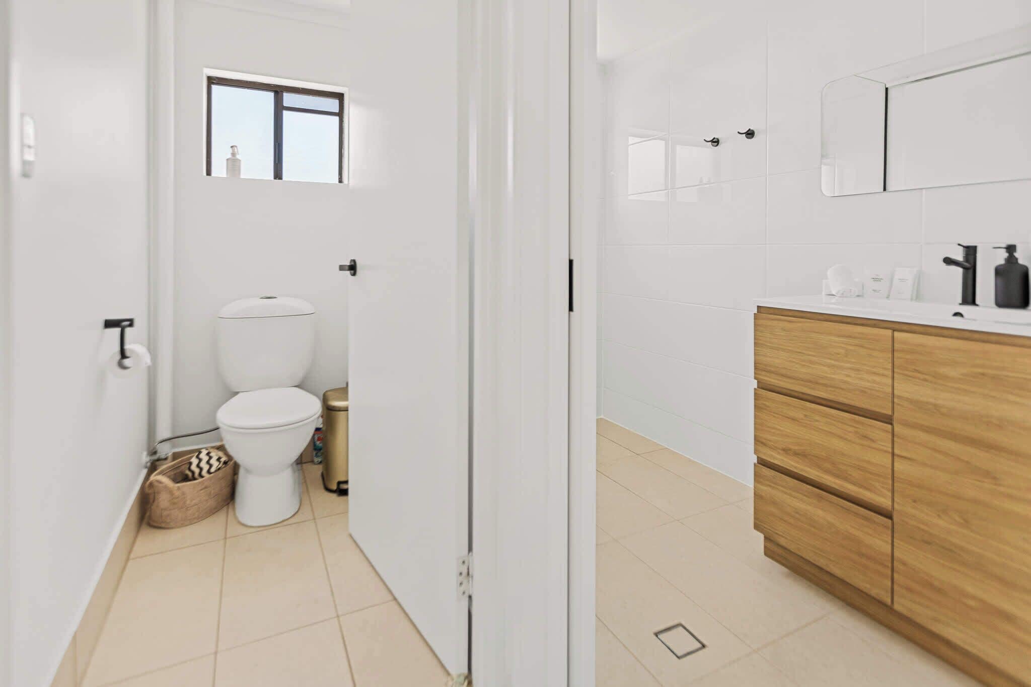 Shower, hair dryer, towels, shampoo