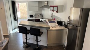 Private kitchen - A village house located 350 meters from the D-Day beaches. (Lion-sur-Mer)