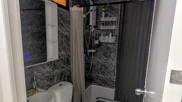 Hair dryer, bidet, towels, soap