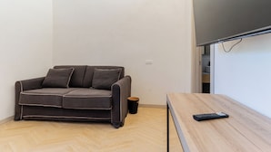 Neljän hengen superior-huone, kaupunkinäköala | Oleskelualue