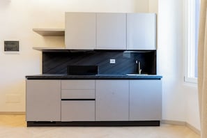 Superior Quadruple Room, City View | Dapur peribadi