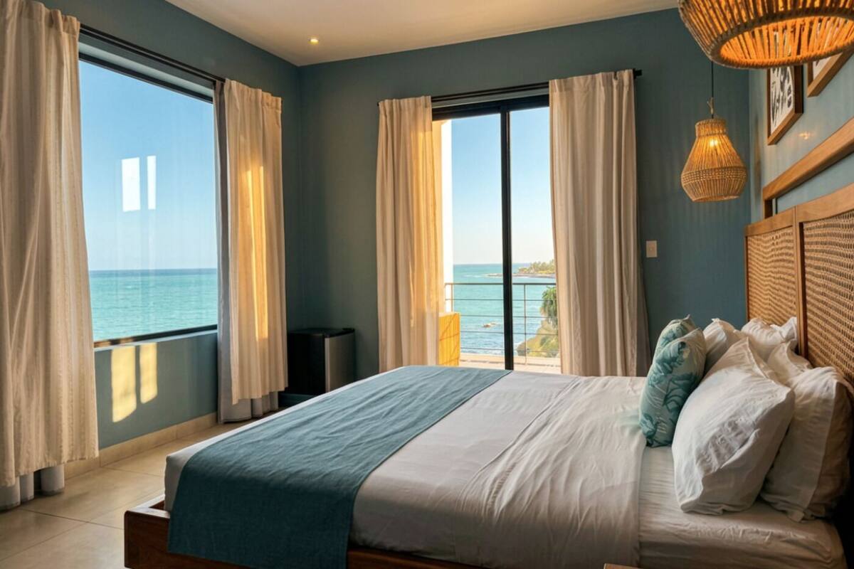 Deluxe Suite, Balcony, Sea View | Iron/ironing board, WiFi (free), bed sheets