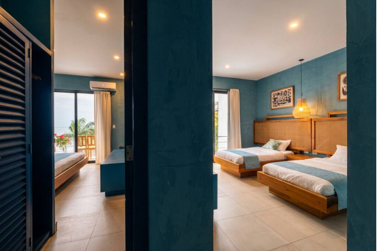 Suite, 2 Bedrooms, Balcony, Partial Sea View | Iron/ironing board, WiFi (free), bed sheets