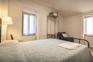 Quarto triplo conforto, vista para a cidade | Wi-Fi de cortesia