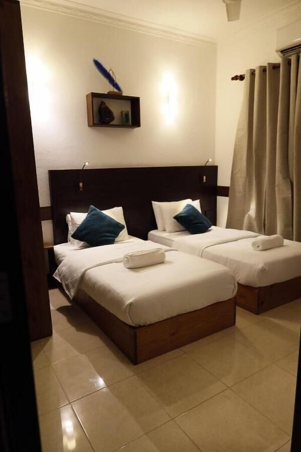 デラックス ダブルまたはツインルーム | 防音設備、アイロン / アイロン台、WiFi (無料)