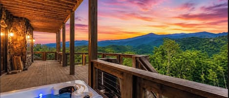 Private hot tub deck with stunning mountain sunset views