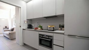 Leilighet (2 Bedrooms) | Eget kjøkken | Espressomaskin, mikrobølgeovn, vannkoker og høy barnestol
