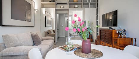 Apartment (2 Bedrooms) | Living area | 32-inch Smart TV with cable channels