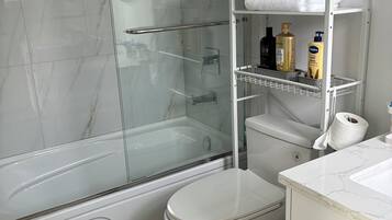 Hair dryer, towels, soap, shampoo