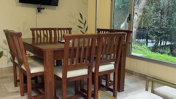 Superior Quadruple Room, Garden View | Television