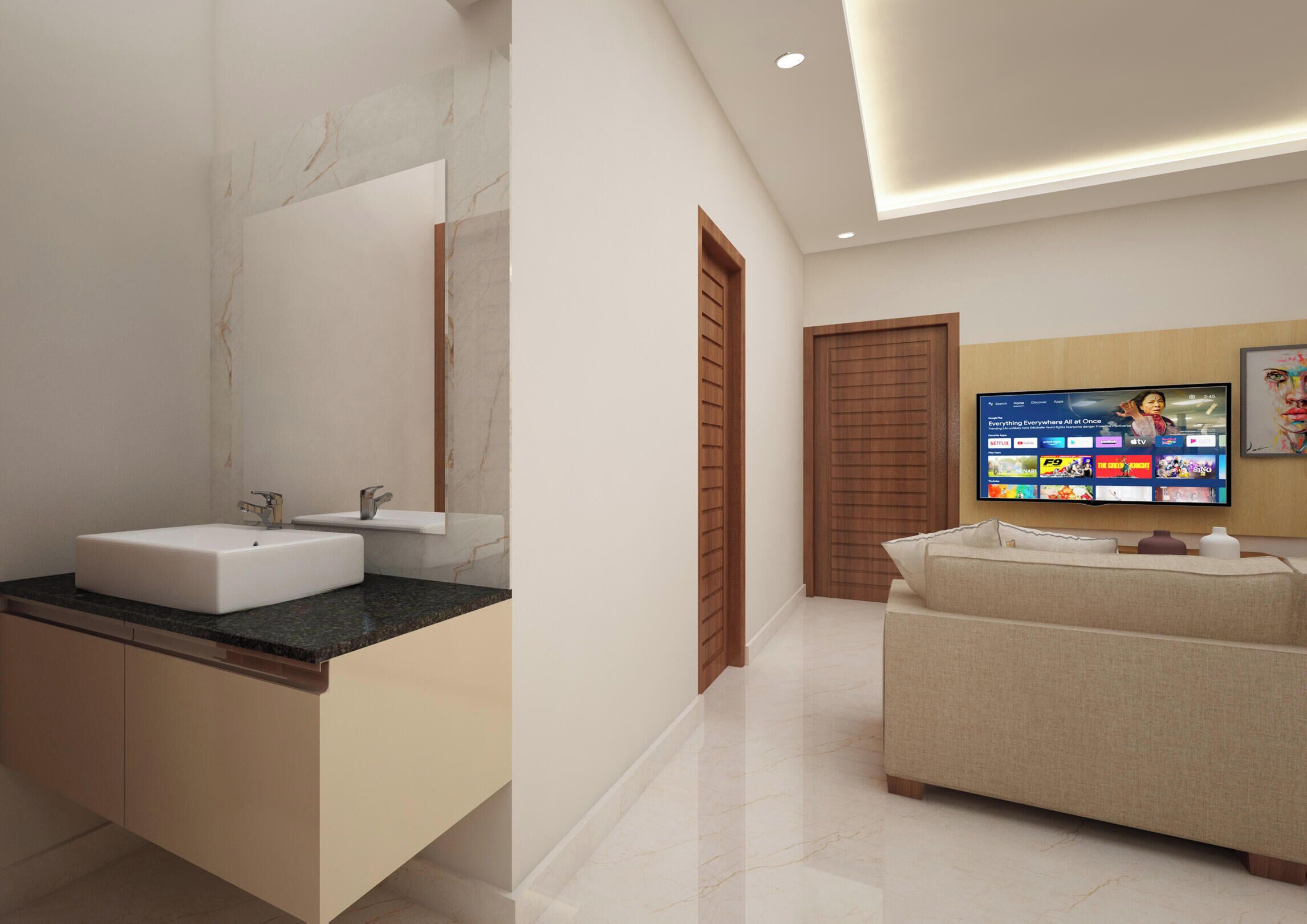 A modern bathroom with a white sink, a large mirror, and a flat-screen TV mounted on the wall.