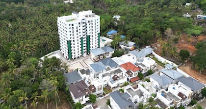 Tranquil 2-bedroom apartment with AC in charming Thundathil